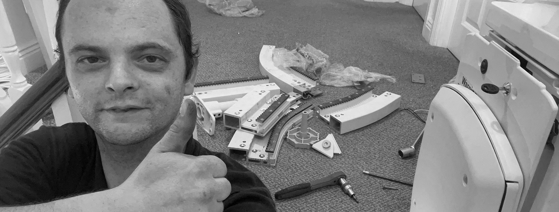 The Mobility Guy repairing a stairlift